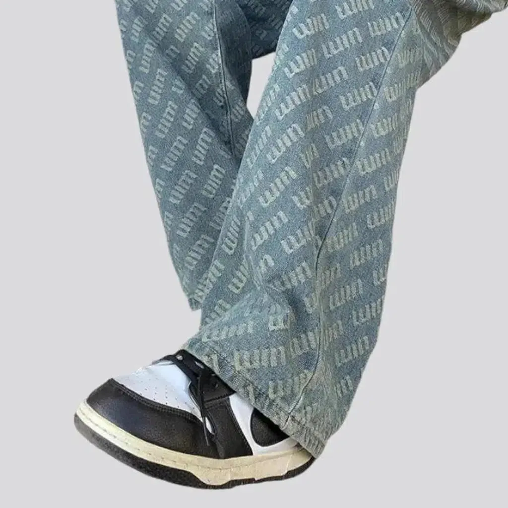 Wide-leg ornament-print jeans